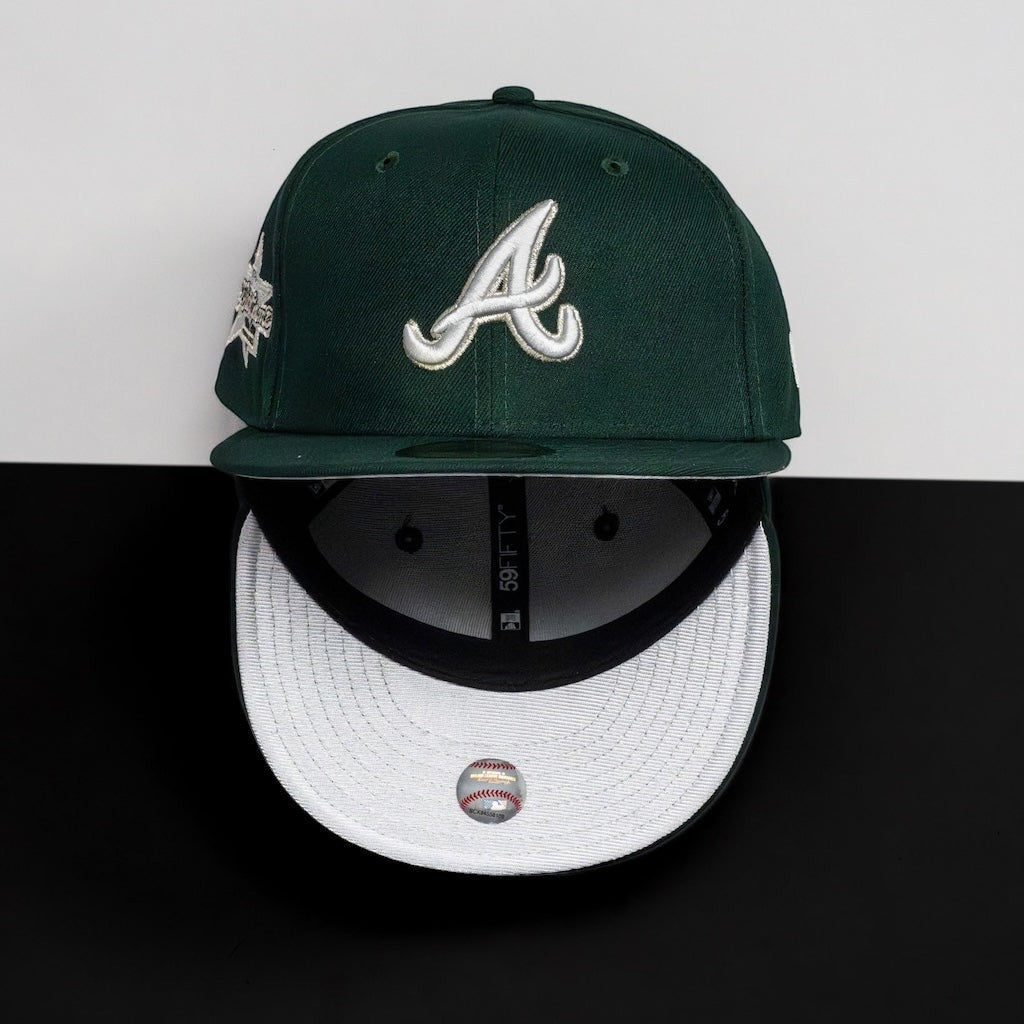 METRO Atlanta Braves green fitted hat with white "A" logo and grey UV underbrim. Features Okefenokee themed side patch.