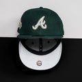 METRO Atlanta Braves green fitted hat with white "A" logo and grey UV underbrim. Features Okefenokee themed side patch.