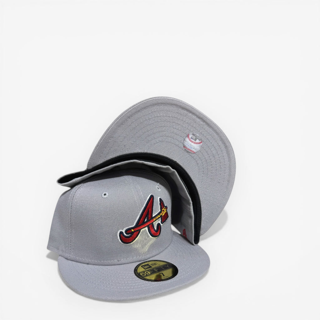 METRO Atlanta Braves 59FIFTY fitted hat in grey with red and yellow embroidered logo and grey UV underbrim.