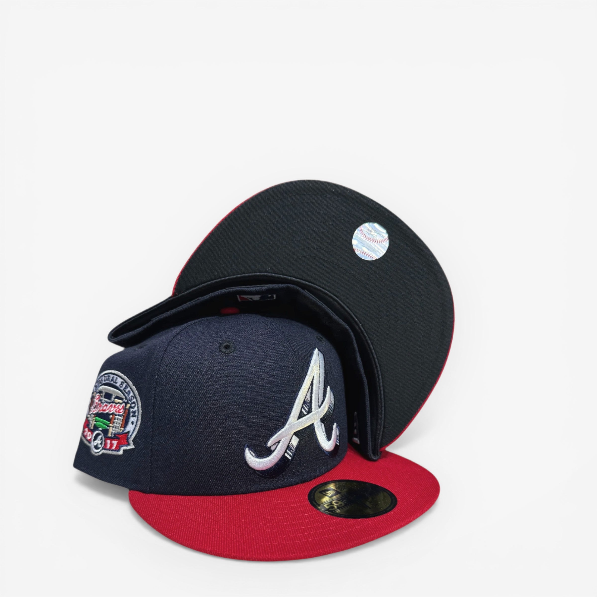 METRO Atlanta Braves navy fitted hat with red brim and black UV underbrim, featuring 'A' logo and Inaugural Season patch.