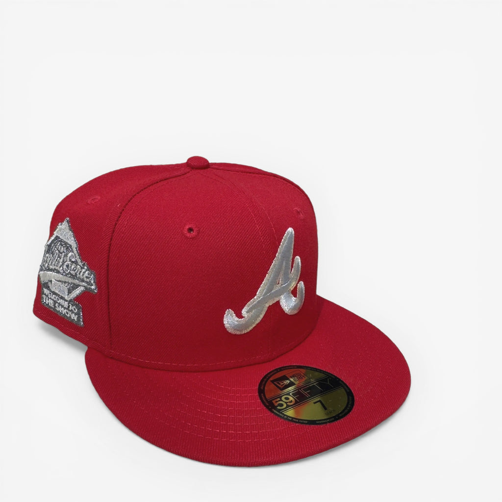 METRO Atlanta Braves red fitted hat with "Welcome to the Show" side patch and light blue underbrim.