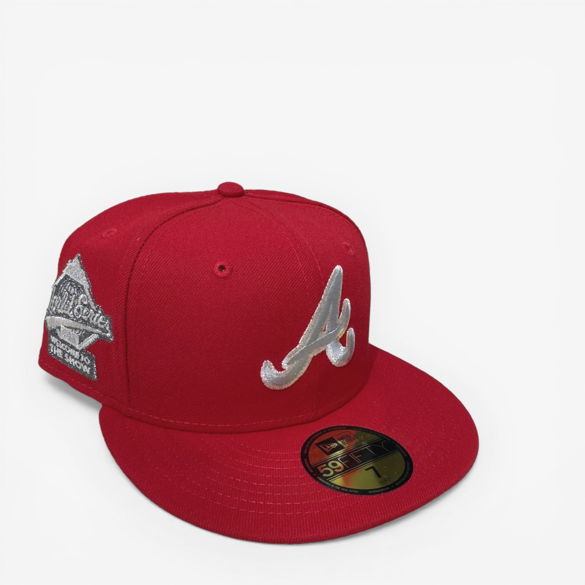 METRO Atlanta Braves red fitted hat with "Welcome to the Show" side patch and light blue underbrim.