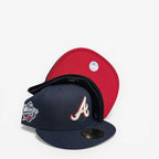 METRO Atlanta Braves navy fitted hat with red underbrim, featuring metallic World Series side patch and embroidered A logo.