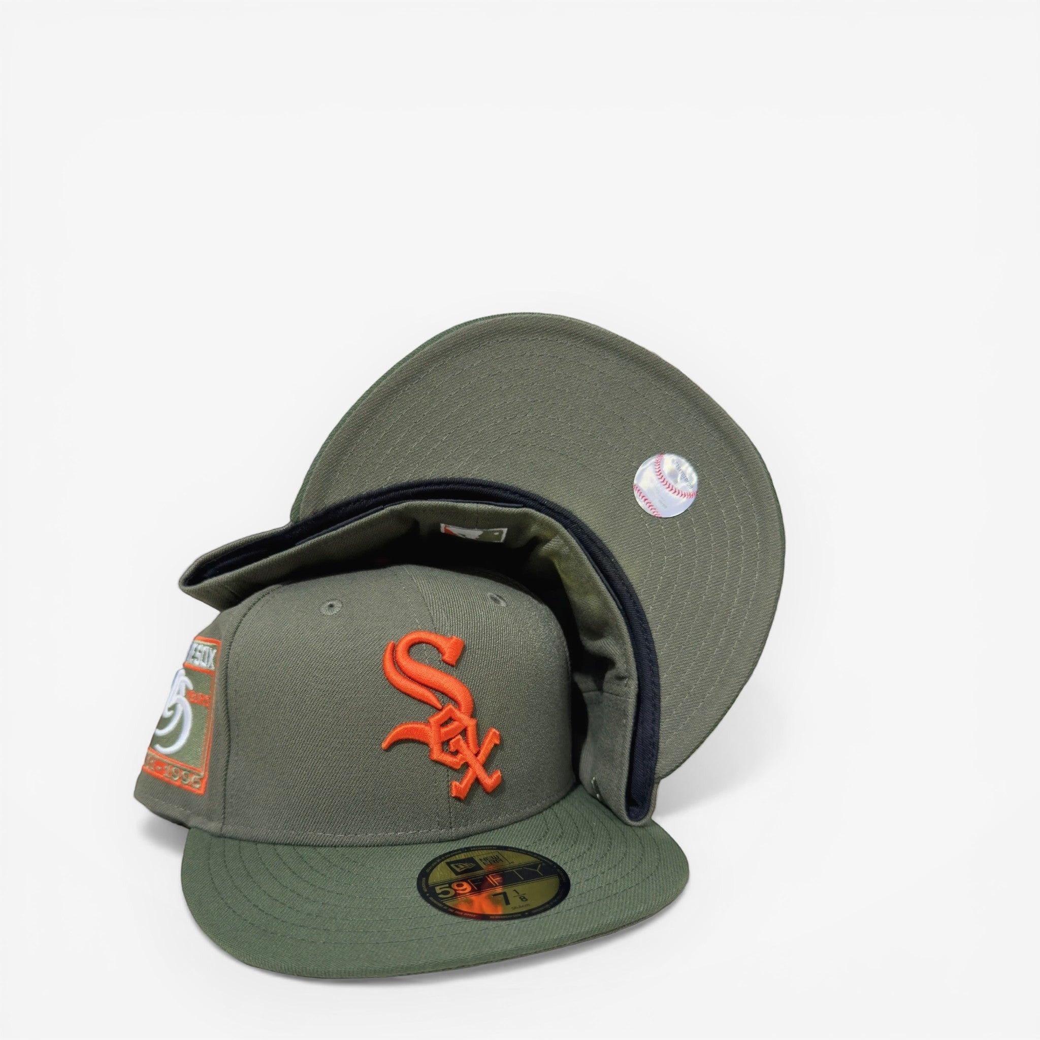 METRO Chicago White Sox 95 Years New Era 59FIFTY fitted hat in olive green with orange logo and commemorative side patch.