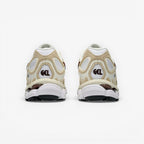 METRO cream and tan mesh sneakers with brown accents and GEL branding on the heel.