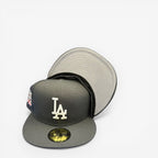 METRO LA Dodgers 100th Anniversary fitted hat in grey with white LA logo and commemorative side patch. Grey UV underbrim.