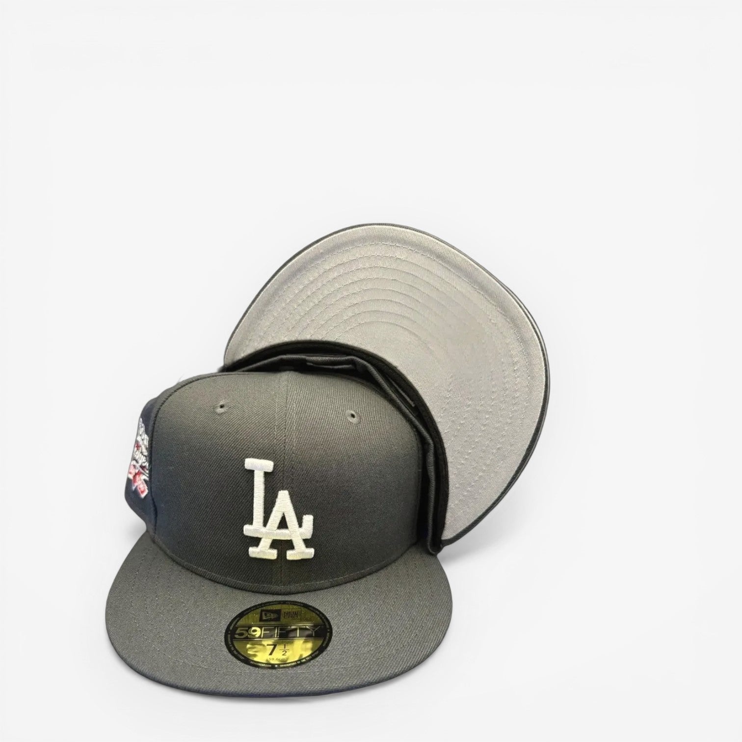 METRO LA Dodgers 100th Anniversary fitted hat in grey with white LA logo and commemorative side patch. Grey UV underbrim.
