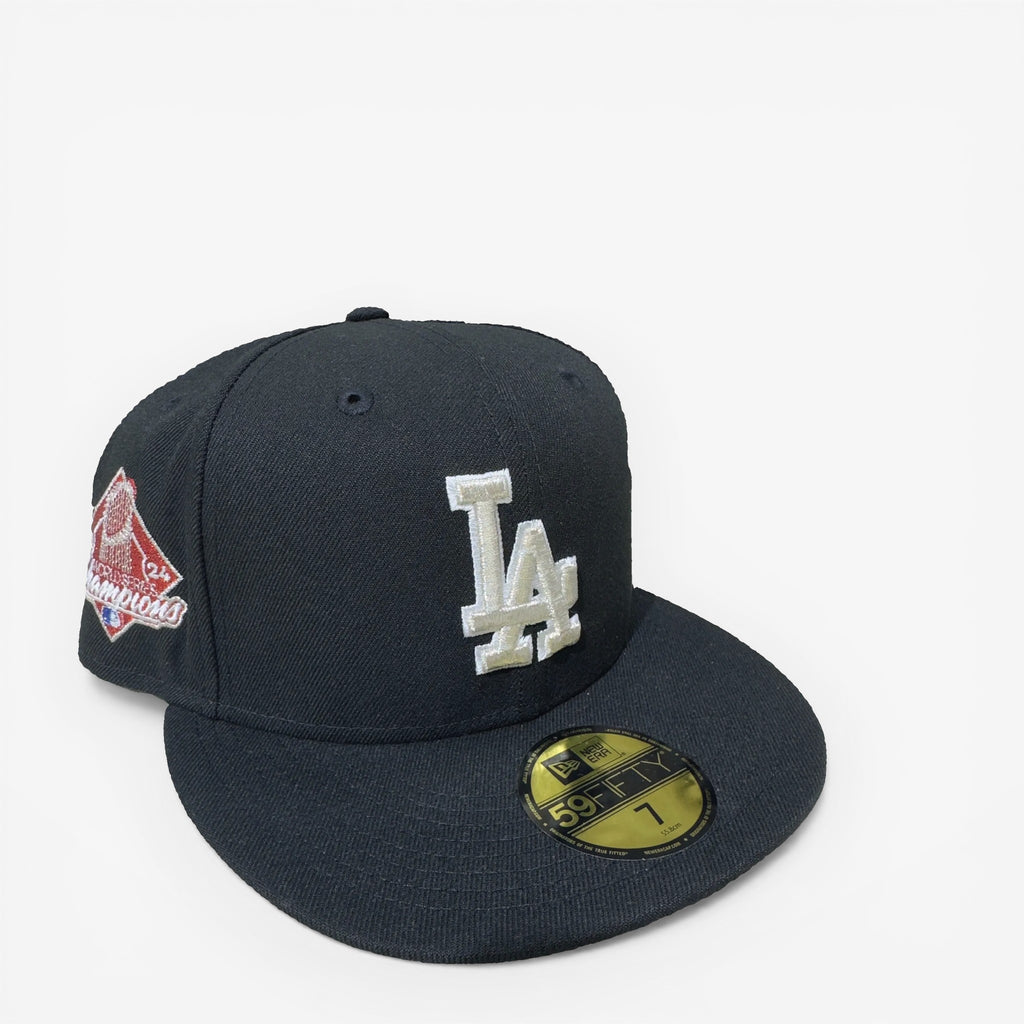 METRO LA Dodgers 2024 World Series Champions black fitted hat with grey UV underbrim and embroidered logo.