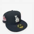 METRO LA Dodgers 2024 World Series Champions black fitted hat with grey UV underbrim and embroidered logo.