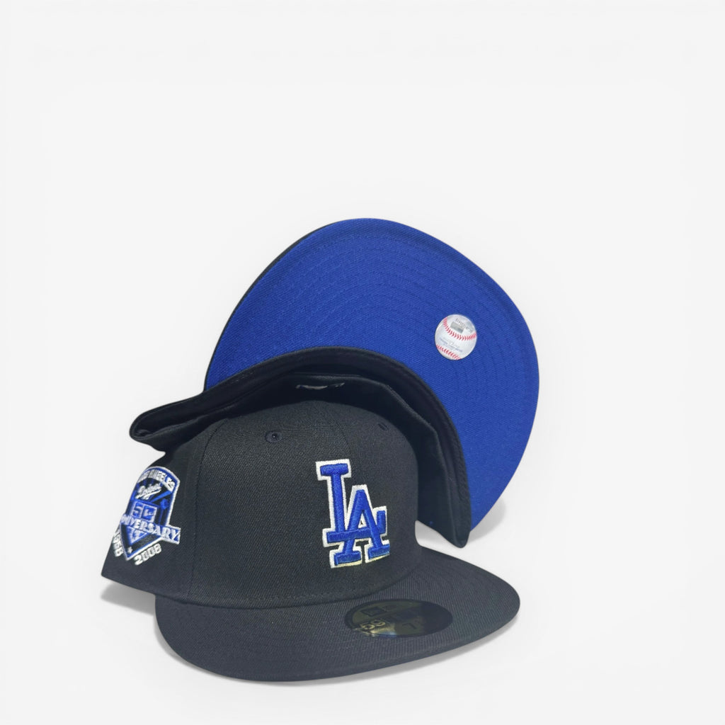 METRO Los Angeles Dodgers 50th Anniversary fitted hat in black with blue embroidery and a blue underbrim. Features a 50th Anniversary side patch.