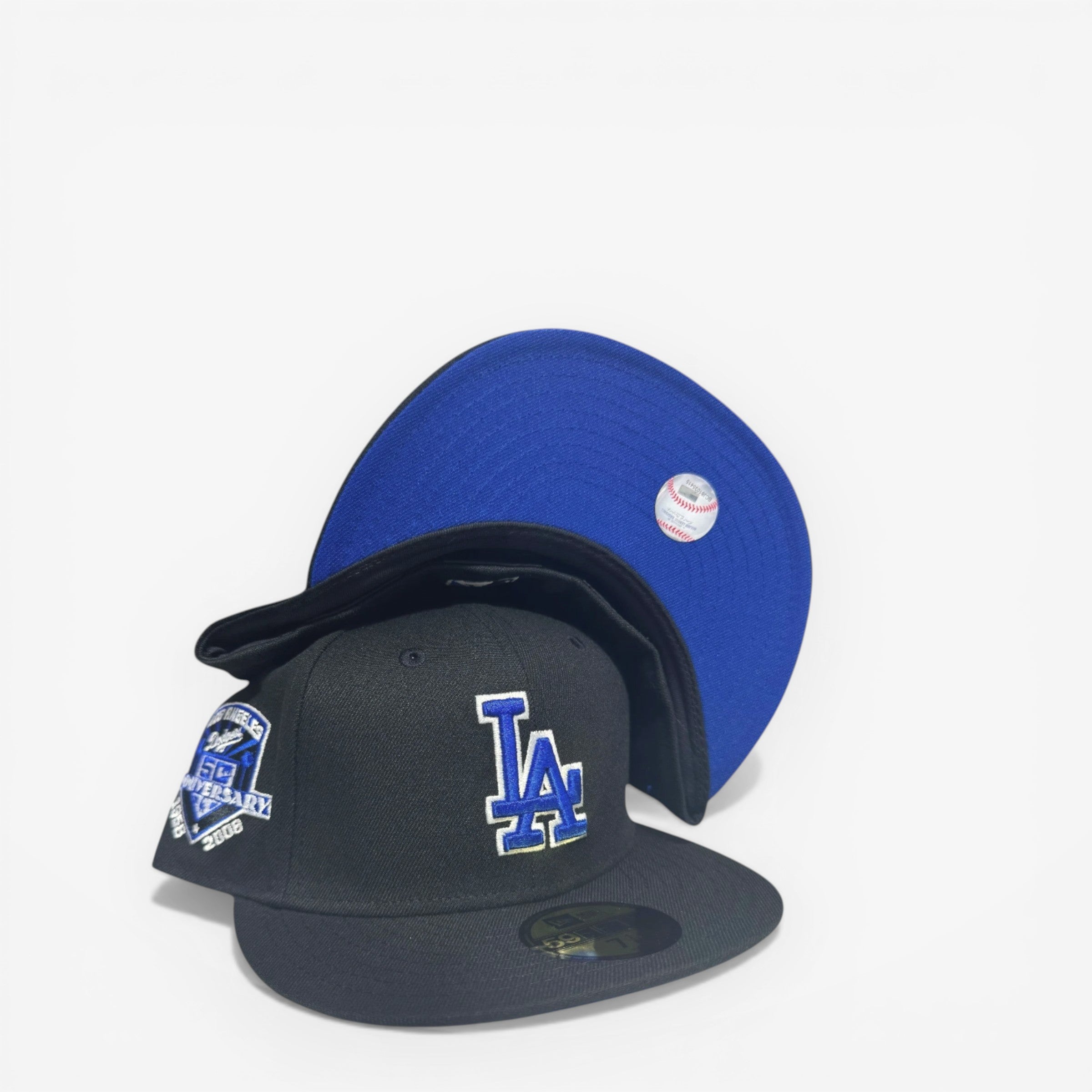 METRO Los Angeles Dodgers 50th Anniversary fitted hat in black with blue embroidery and a blue underbrim. Features a 50th Anniversary side patch.
