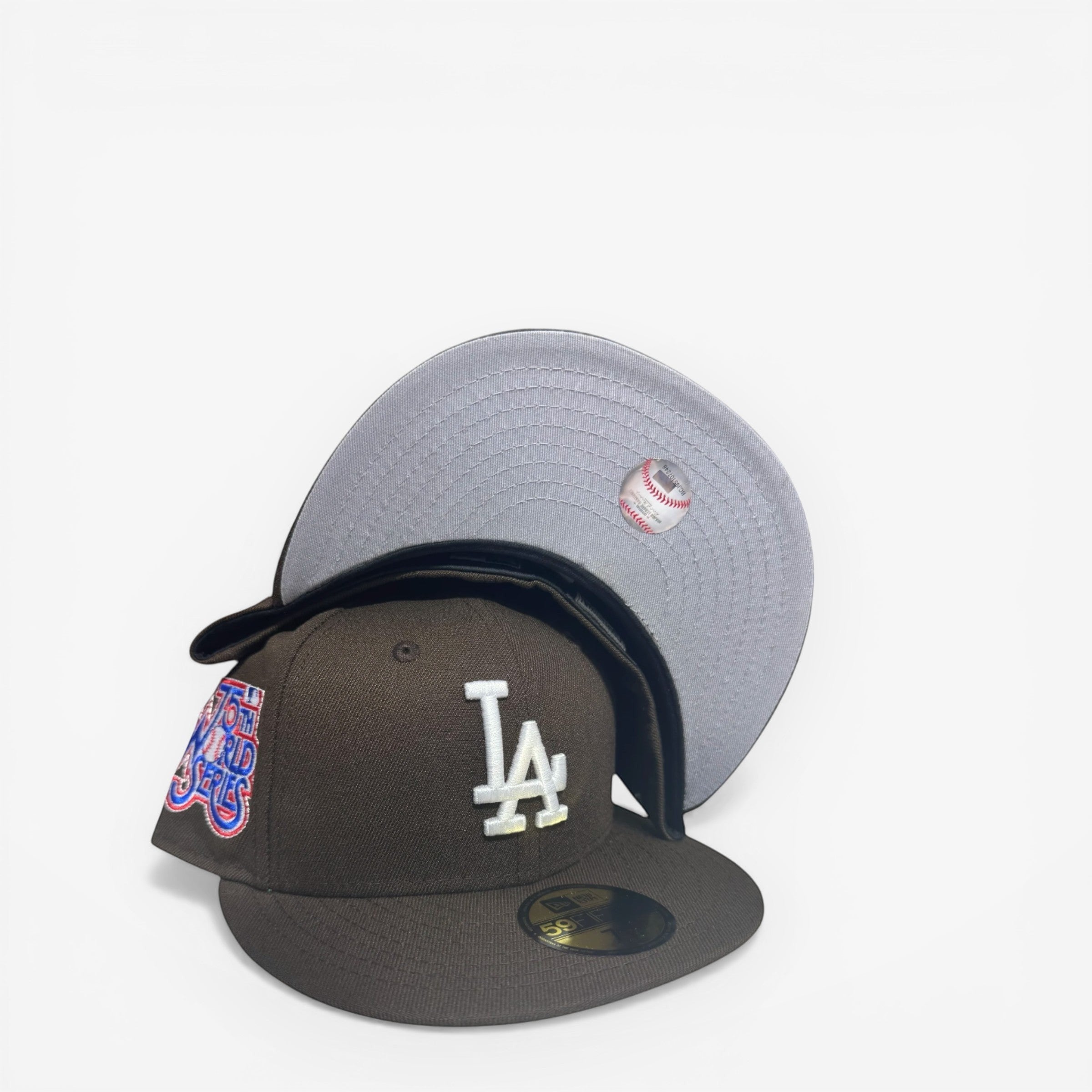 METRO Los Angeles Dodgers 75th Anniversary fitted hat in brown with white LA logo and grey underbrim. Features 75th Anniversary patch.
