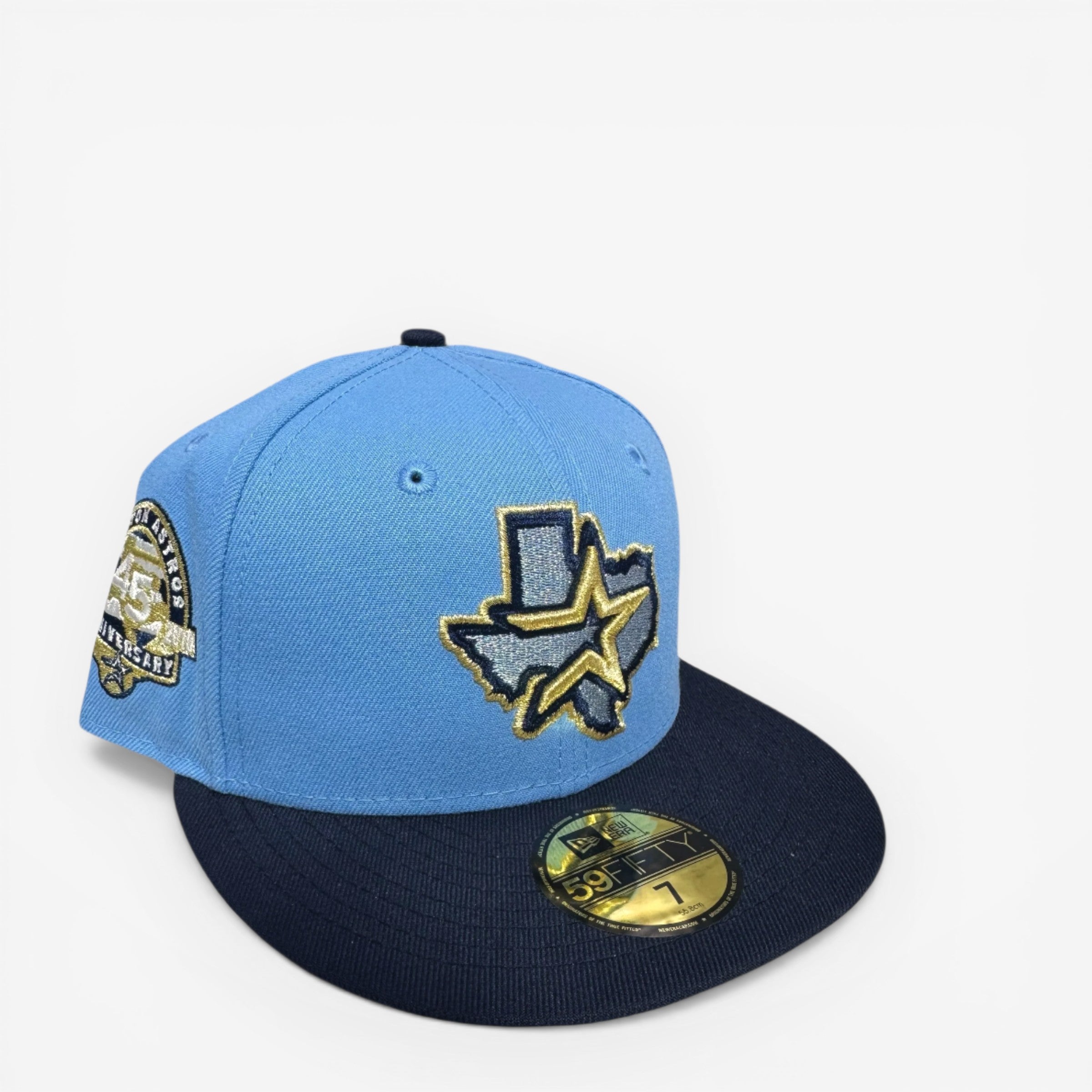 METRO Houston Astros 45th Anniversary fitted hat in blue with navy brim and grey UV underbrim. Features commemorative patch and embroidered logo.