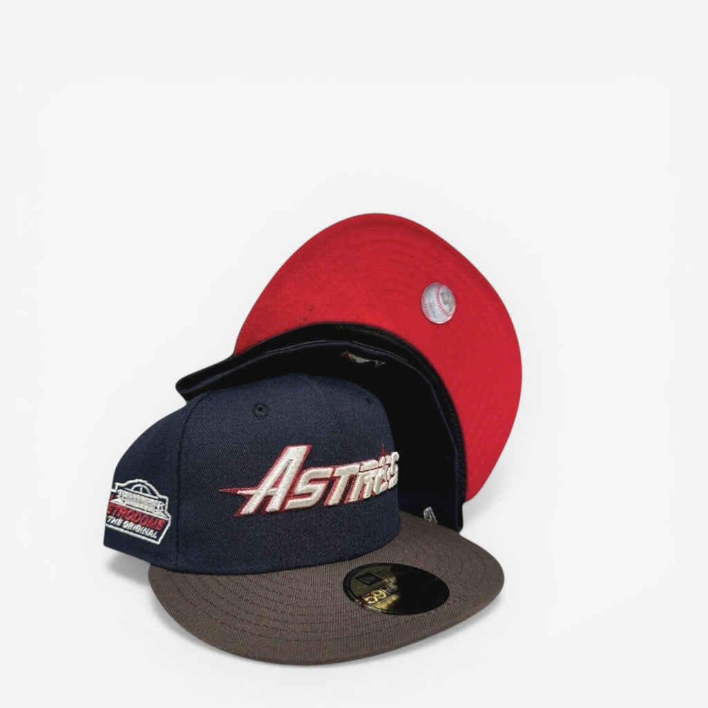 METRO Houston Astros Astrodome New Era 59FIFTY fitted hat in navy with red underbrim and brown brim. Features Astrodome side patch.