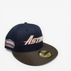 METRO Houston Astros Astrodome New Era 59FIFTY fitted hat in navy with brown brim and red underbrim. Features embroidered Astros logo and Astrodome side patch.