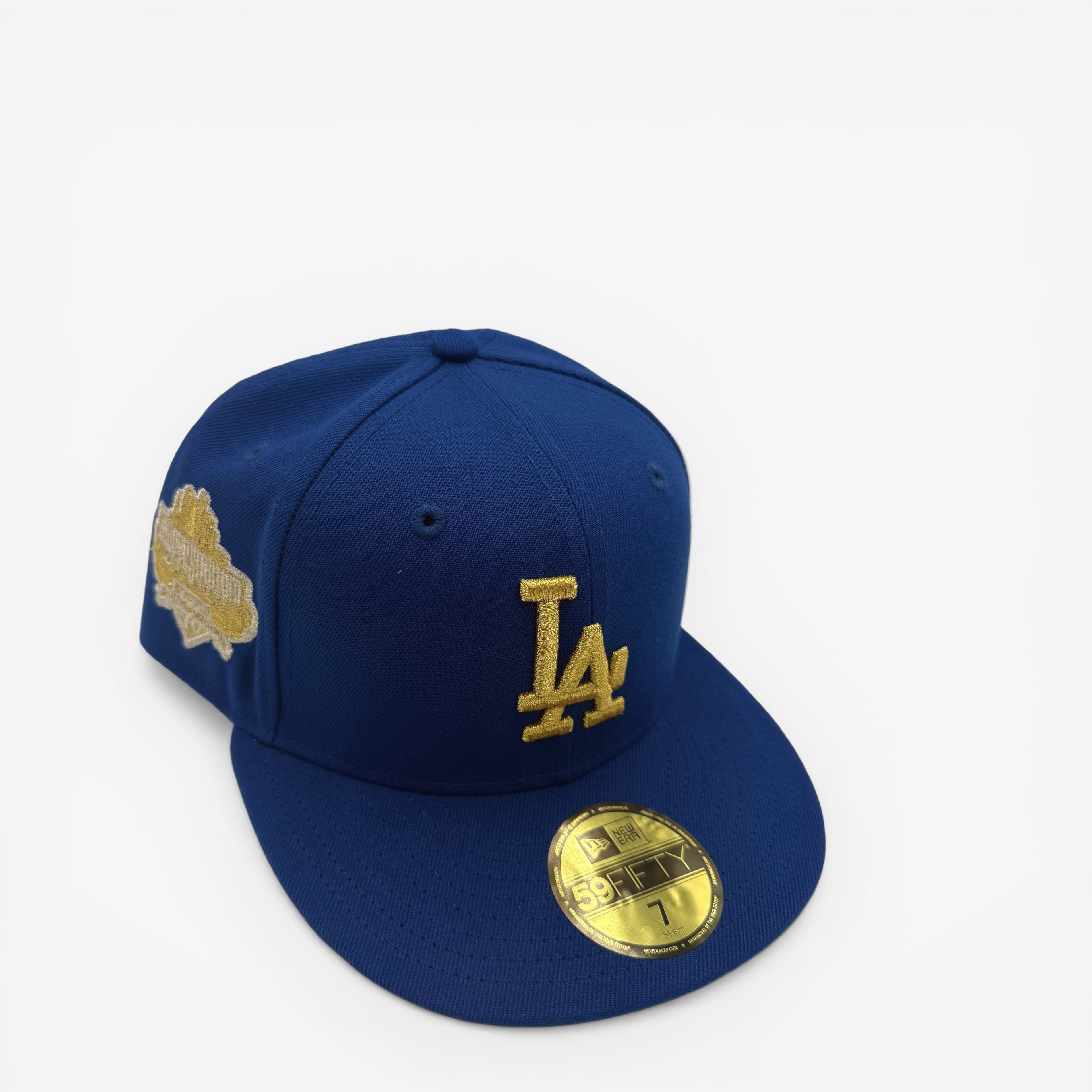 METRO LA Dodgers blue fitted hat with gold LA logo and Dodger Stadium patch. New Era 59FIFTY silhouette.