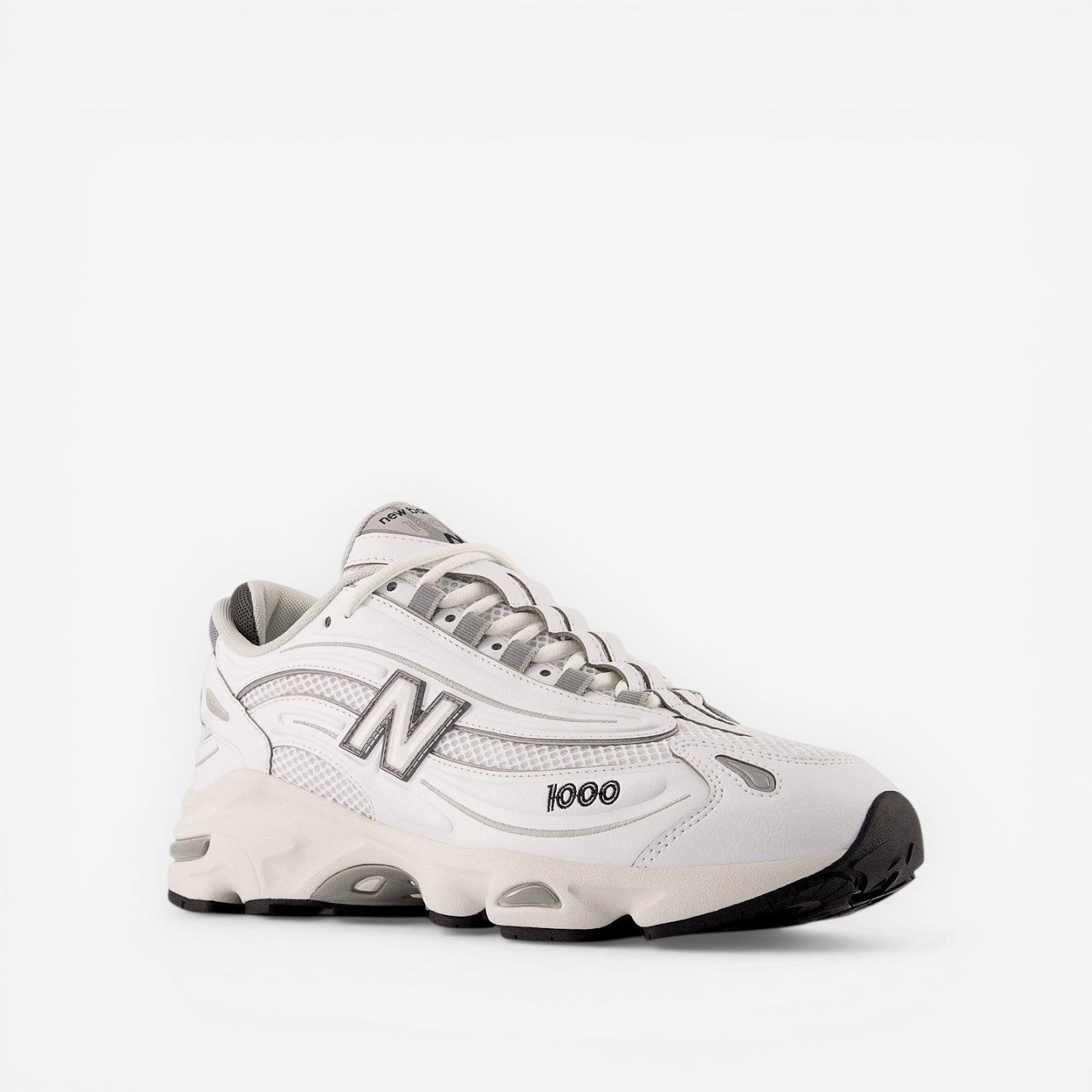 new balance white sneaker with black and grey accents, athletic footwear for men