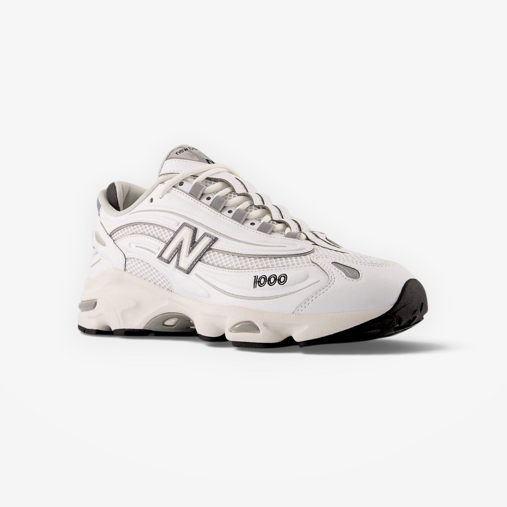 new balance white sneaker with black and grey accents, athletic footwear for men
