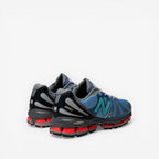 METRO Action Bronson x New Balance 1890 Medusa Azul blue mesh and suede sneakers with grey accents and red sole details.