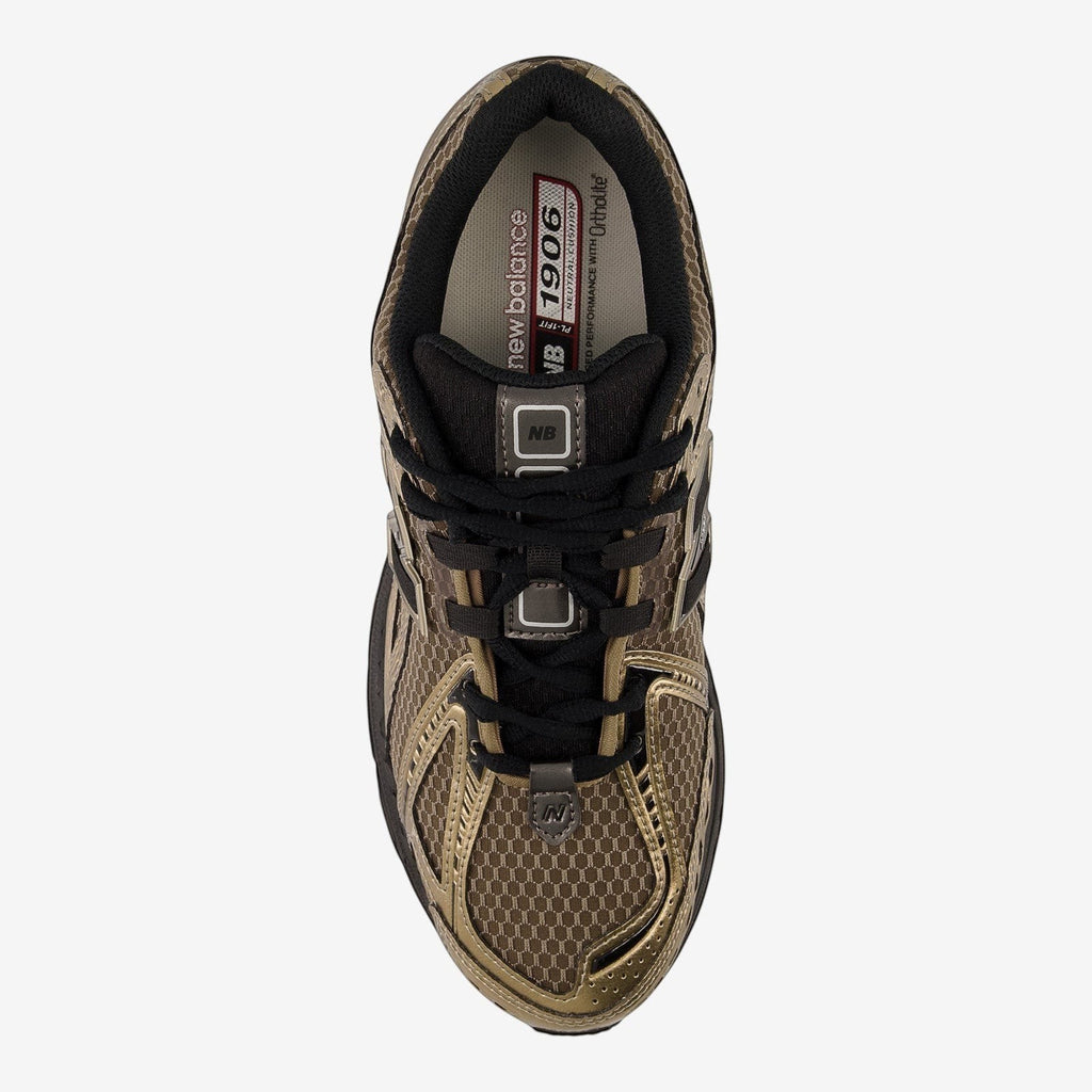 METRO New Balance 1906R sneaker in black and bronze featuring a mesh and suede upper, top-down view.