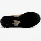 METRO New Balance 1906R sneaker showing the black and bronze textured rubber outsole and cushioned midsole design