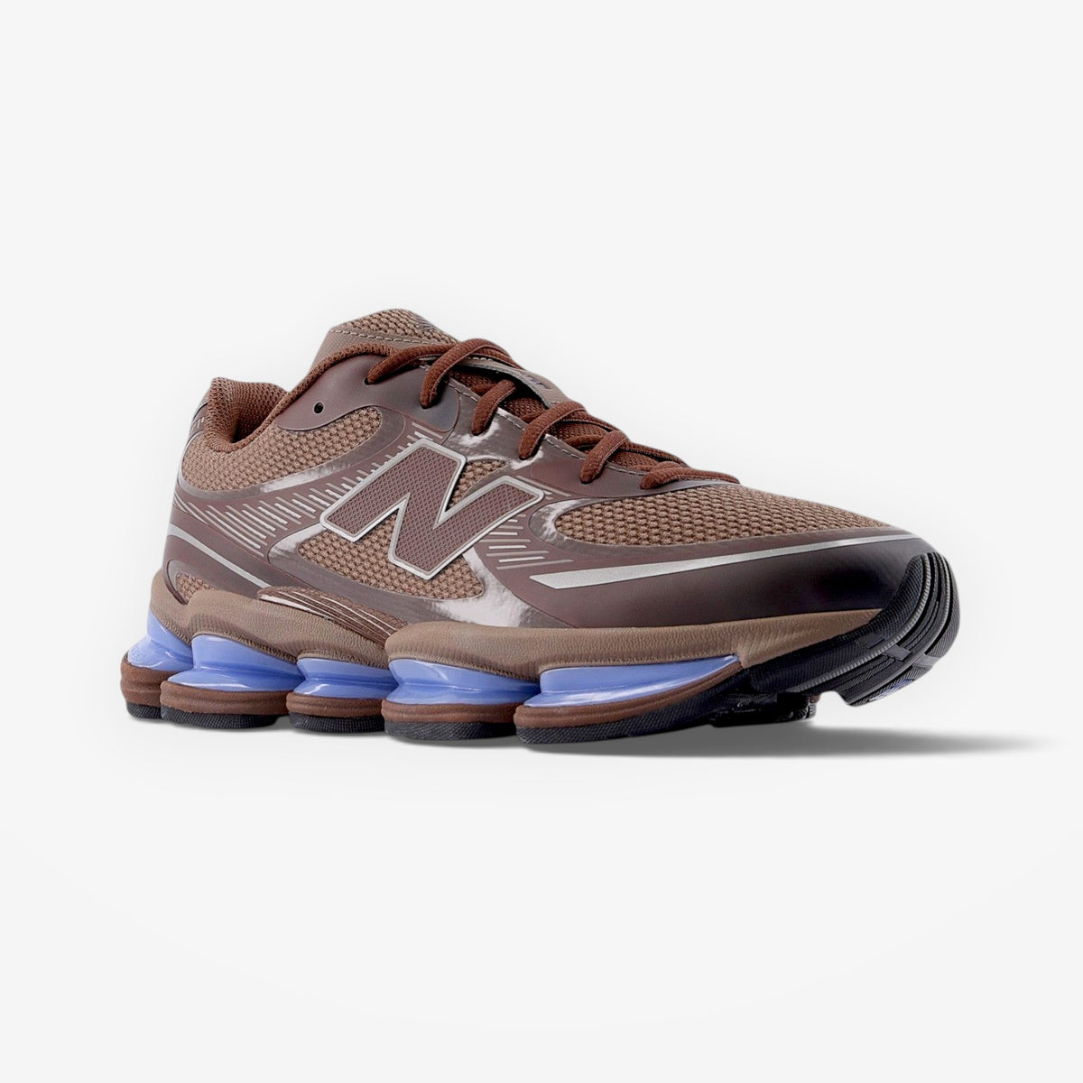 METRO New Balance 2000 Pumpernickel sneaker in brown mesh with reflective accents and a blue cushioned sole.