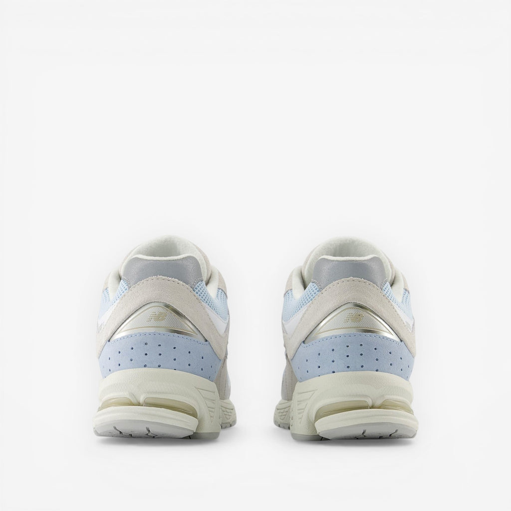 METRO New Balance 2002R blue suede and mesh running sneakers with N-ergy foam sole.