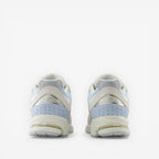 METRO New Balance 2002R blue suede and mesh running sneakers with N-ergy foam sole.