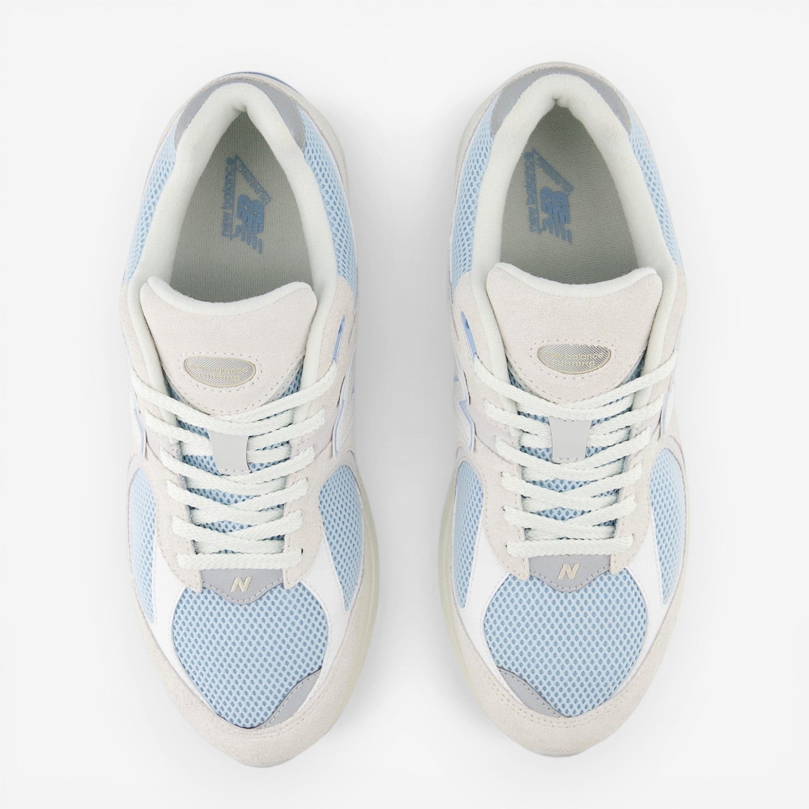 New Balance light blue mesh and suede sneakers, top view, footwear for men and women