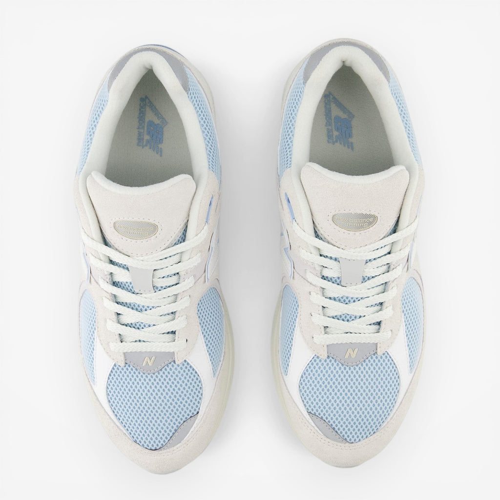 New Balance light blue mesh and suede sneakers, top view, footwear for men and women