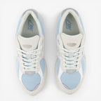New Balance light blue mesh and suede sneakers, top view, footwear for men and women