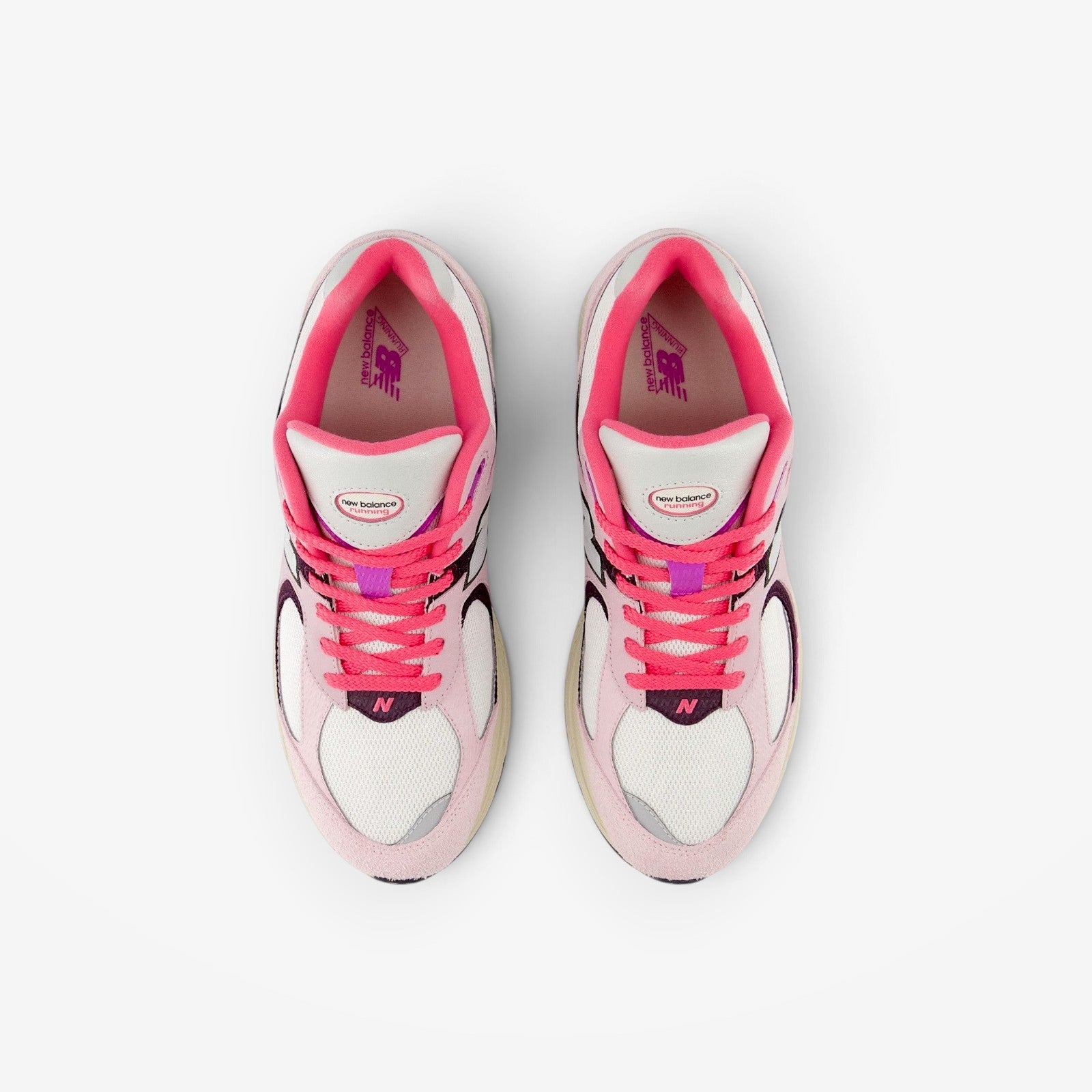 METRO New Balance 2002R sneakers in twilight haze and passion fruit pink suede and mesh, top-down view.