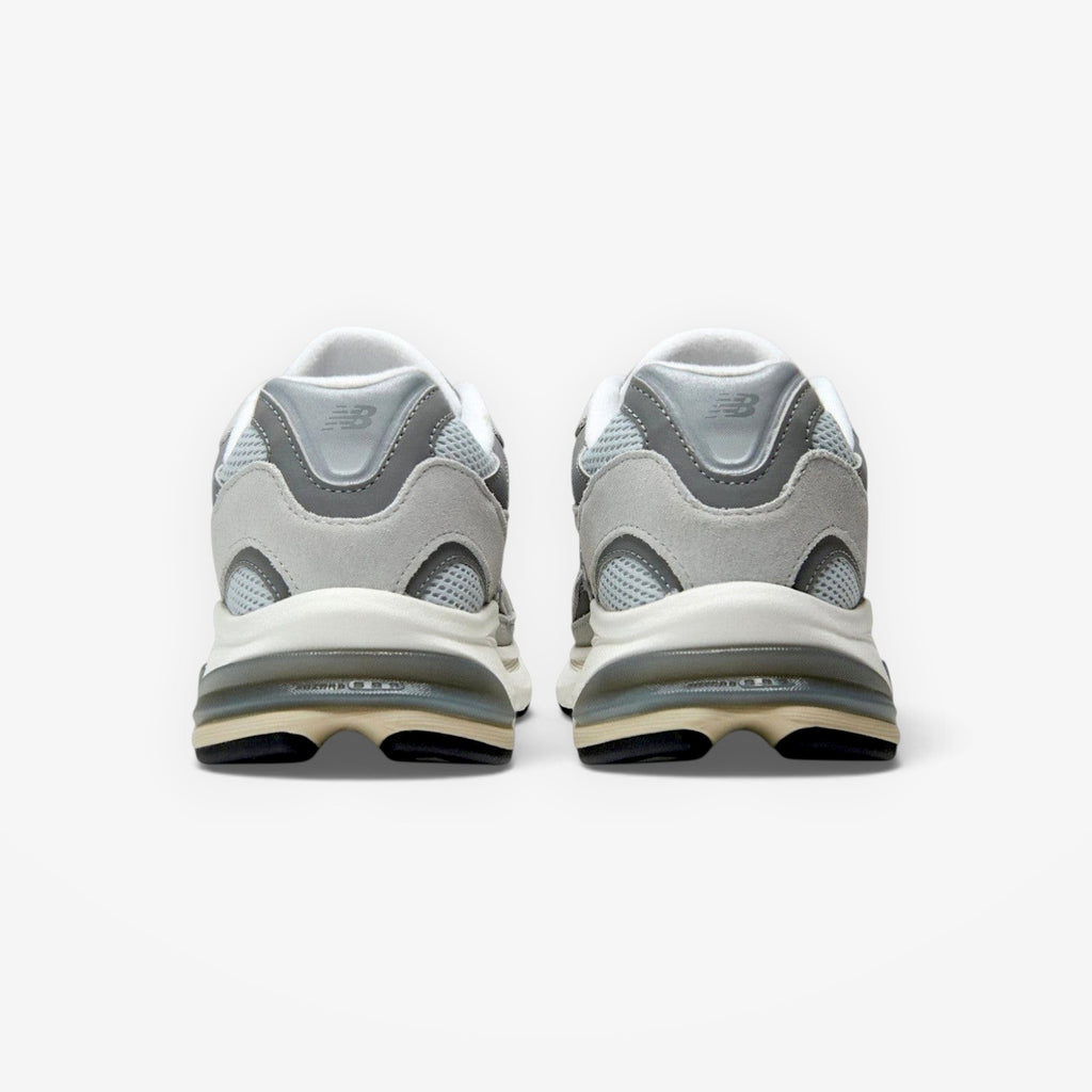 METRO New Balance 2010 sneakers in raincloud and harbor grey, showing the rear view of the mesh and suede heel design.
