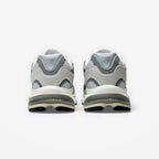 METRO New Balance 2010 sneakers in raincloud and harbor grey, showing the rear view of the mesh and suede heel design.