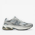 METRO New Balance 2010 sneakers in Raincloud and Harbor Grey. Mesh, suede, and synthetic upper with cushioned foam midsole and rubber outsole.