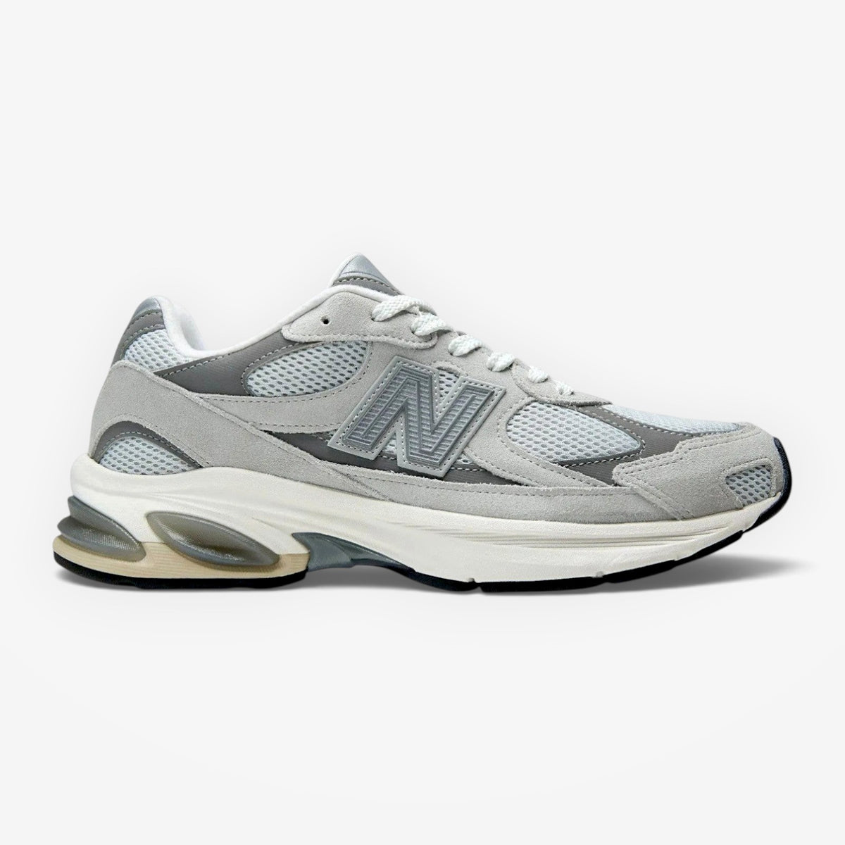 METRO New Balance 2010 sneaker in Raincloud and Harbor Grey featuring mesh, suede, and synthetic layered upper.