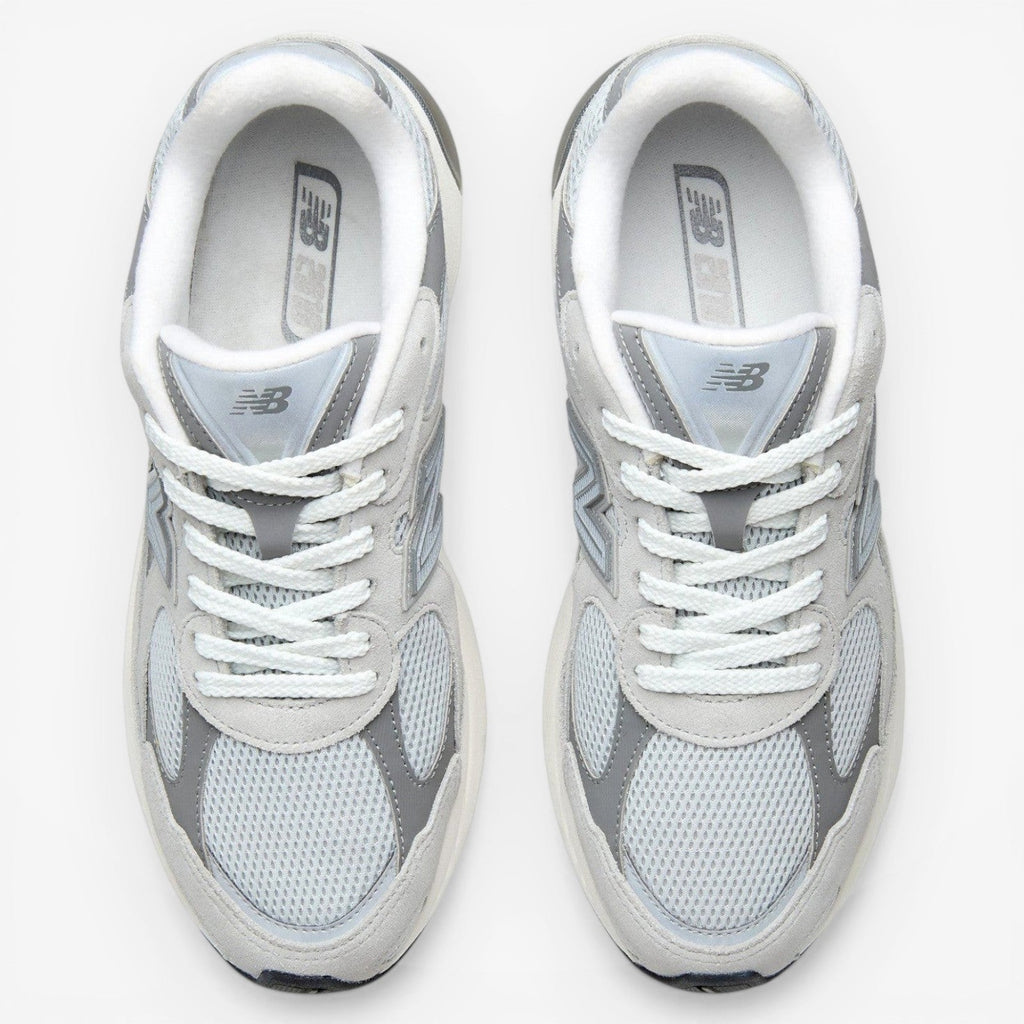 METRO New Balance 2010 sneakers in Raincloud and Harbor Grey. Mesh, suede, and synthetic upper with cushioned foam midsole and rubber outsole.