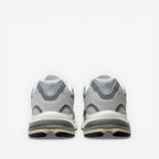 METRO New Balance 2010 sneakers in Raincloud and Harbor Grey. Mesh, suede, and synthetic upper with cushioned foam midsole and rubber outsole.