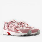new balance sneakers in pink and white mesh with suede accents and chunky sole, footwear