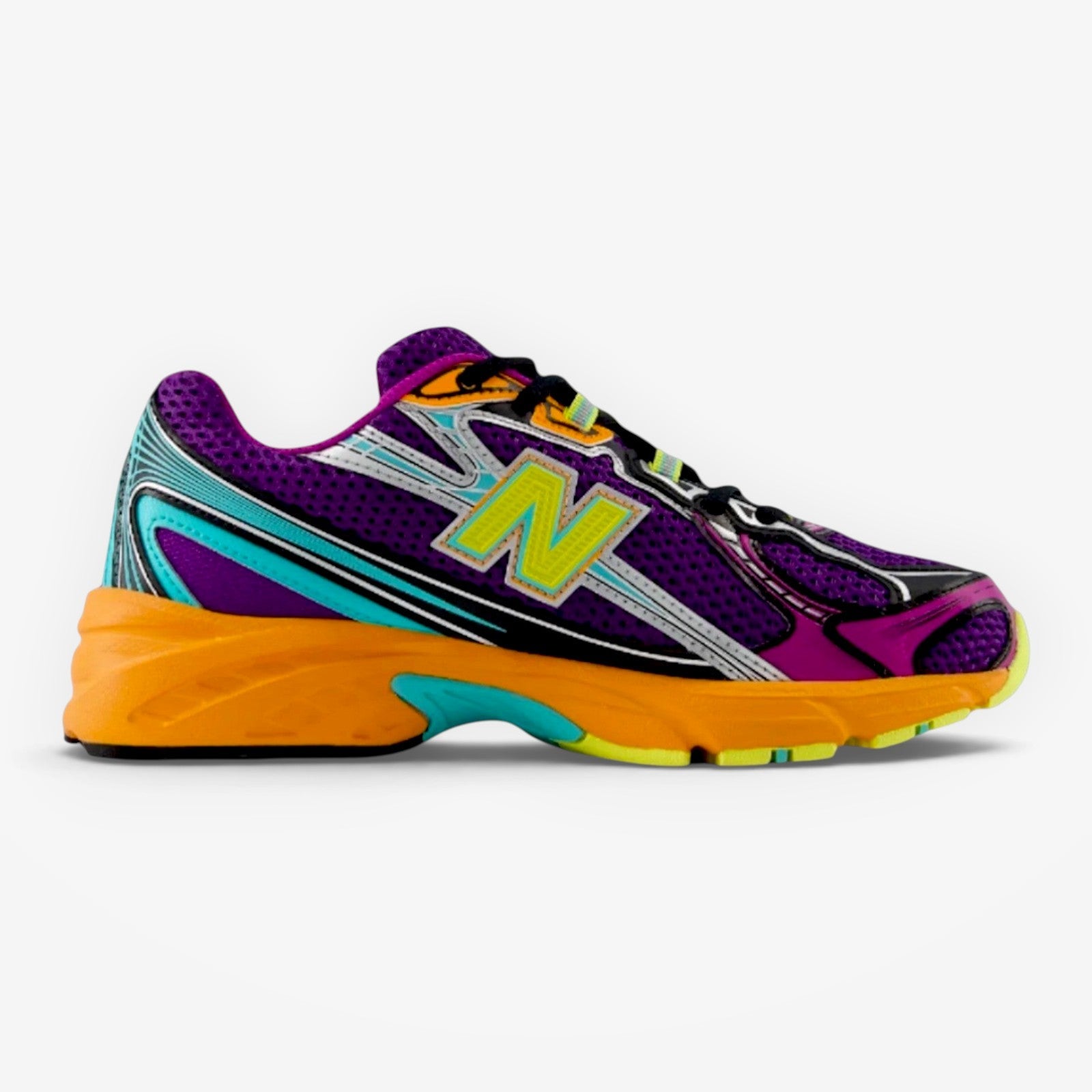 METRO New Balance 740 running shoe in purple, orange, and neon yellow mesh with metallic silver angular overlays.