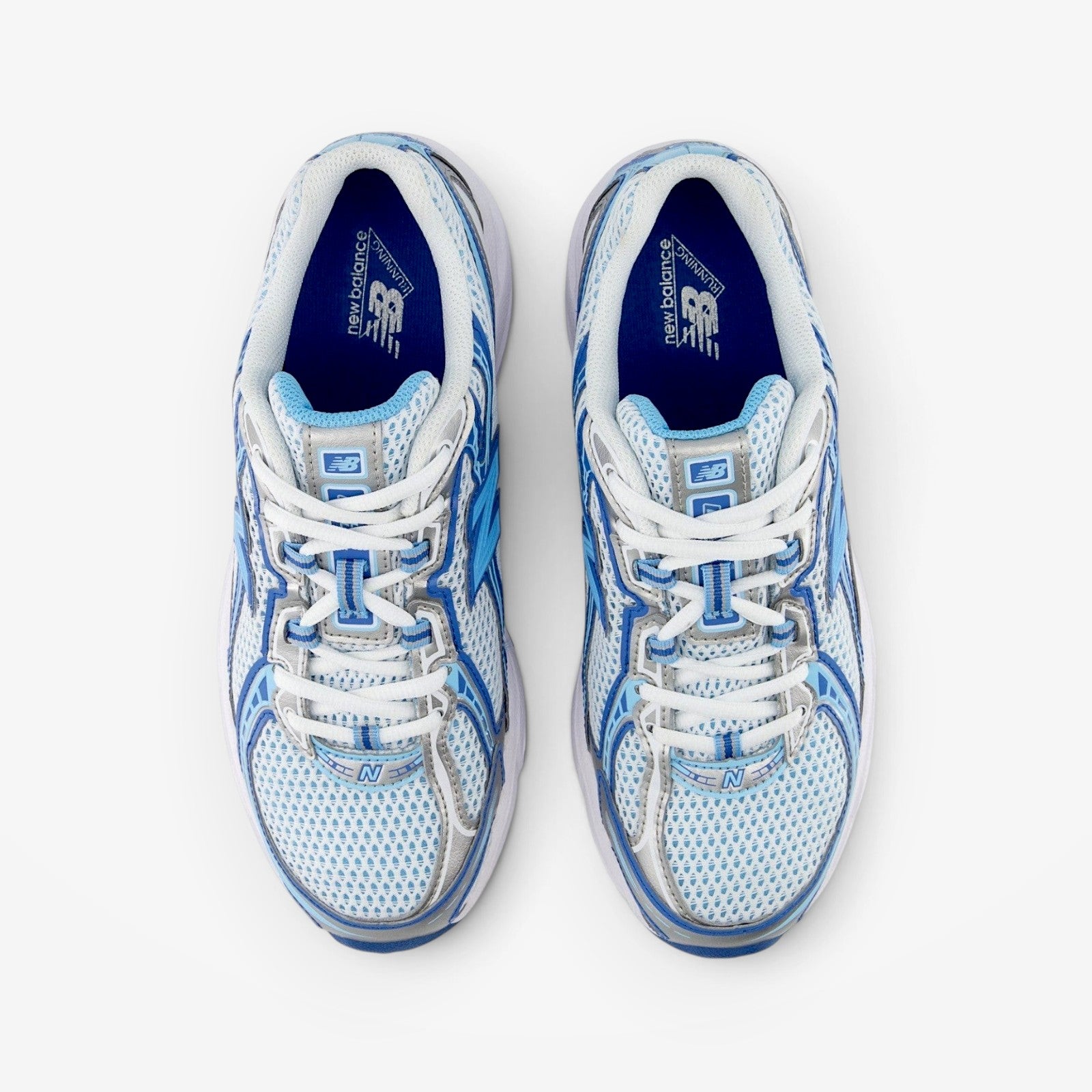 METRO New Balance 740v2 sneakers in blue agate and white with mesh, suede, and synthetic overlays, top-down view.