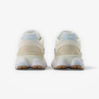 Rear view of METRO New Balance 9060 sneakers in bisque and frosted glass suede and mesh with sculpted midsoles.