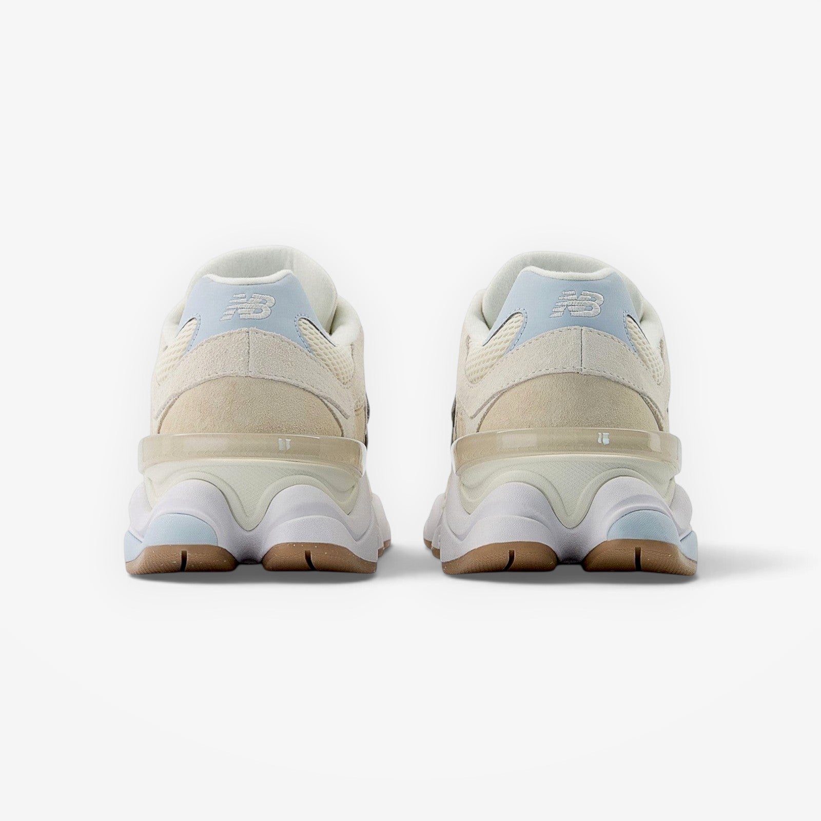Rear view of METRO New Balance 9060 sneakers in bisque and frosted glass suede and mesh with sculpted midsoles.
