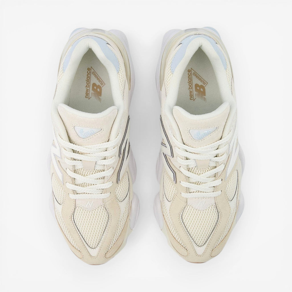 New Balance cream mesh sneakers with white laces, top view of footwear