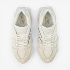New Balance cream mesh sneakers with white laces, top view of footwear