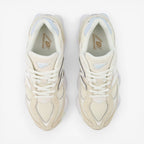 New Balance cream mesh sneakers with white laces, top view of footwear