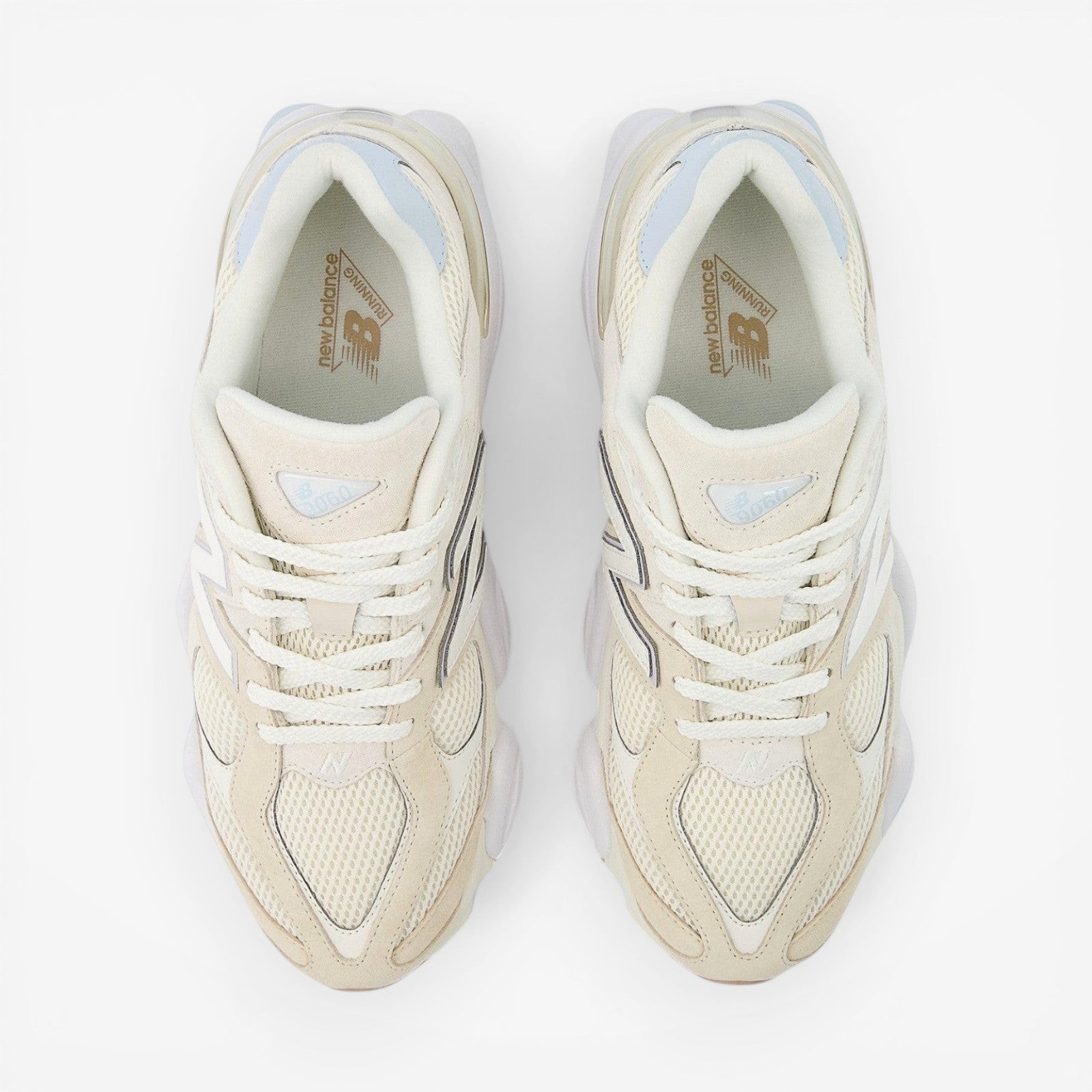 New Balance cream mesh sneakers with white laces, top view of footwear