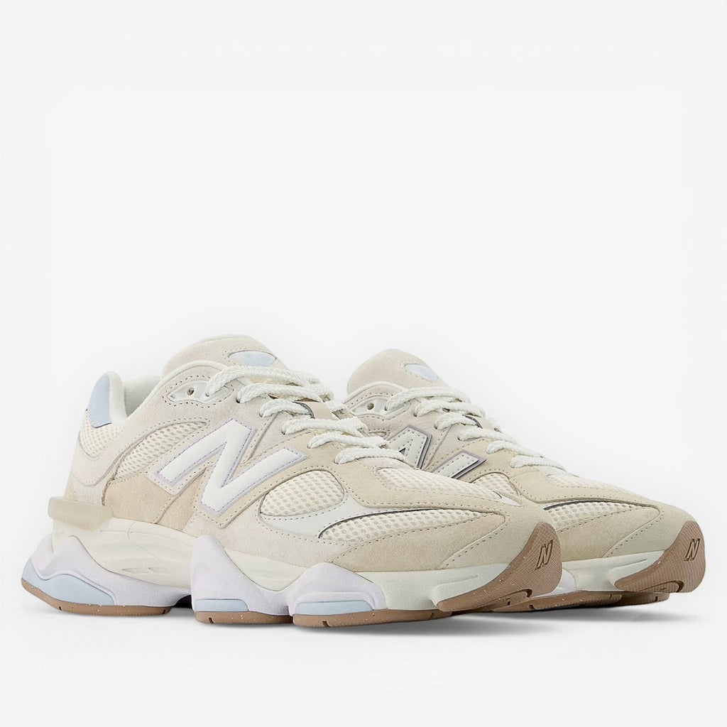 Beige New Balance sneakers with mesh and suede details, ideal footwear for sneaker enthusiasts.