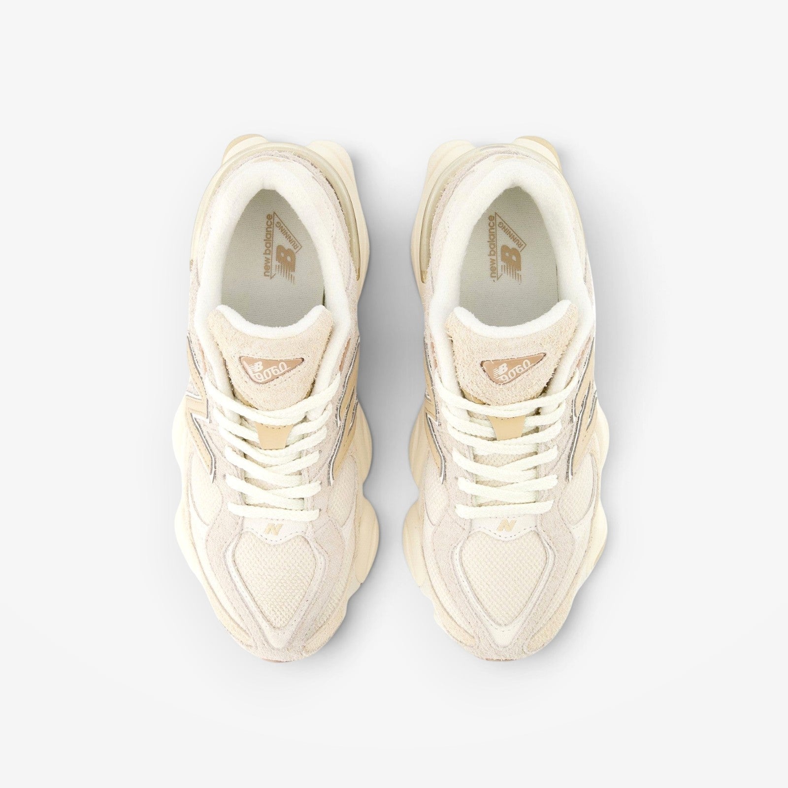METRO New Balance 9060 sneakers in bisque and sea salt featuring mesh and suede layered design, top-down view.