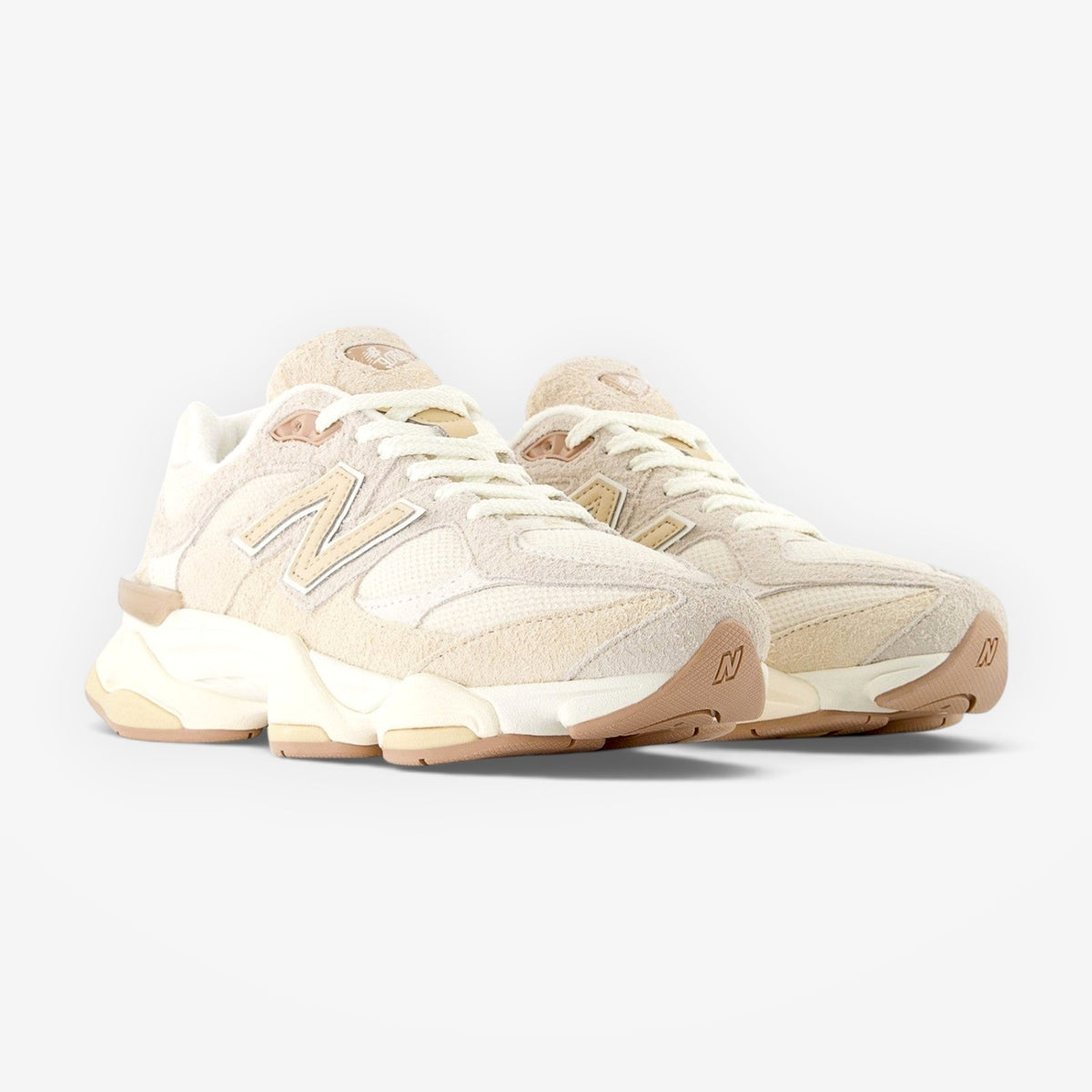METRO New Balance 9060 sneakers in bisque and sea salt featuring mesh and suede layered design with sculpted midsole